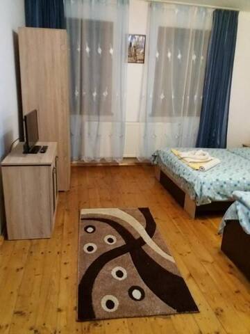 Фото номера Трехместный номер с собственной ванной комнатой Гостевой дом Casa Floare de Colt г. Кырцишоара 13